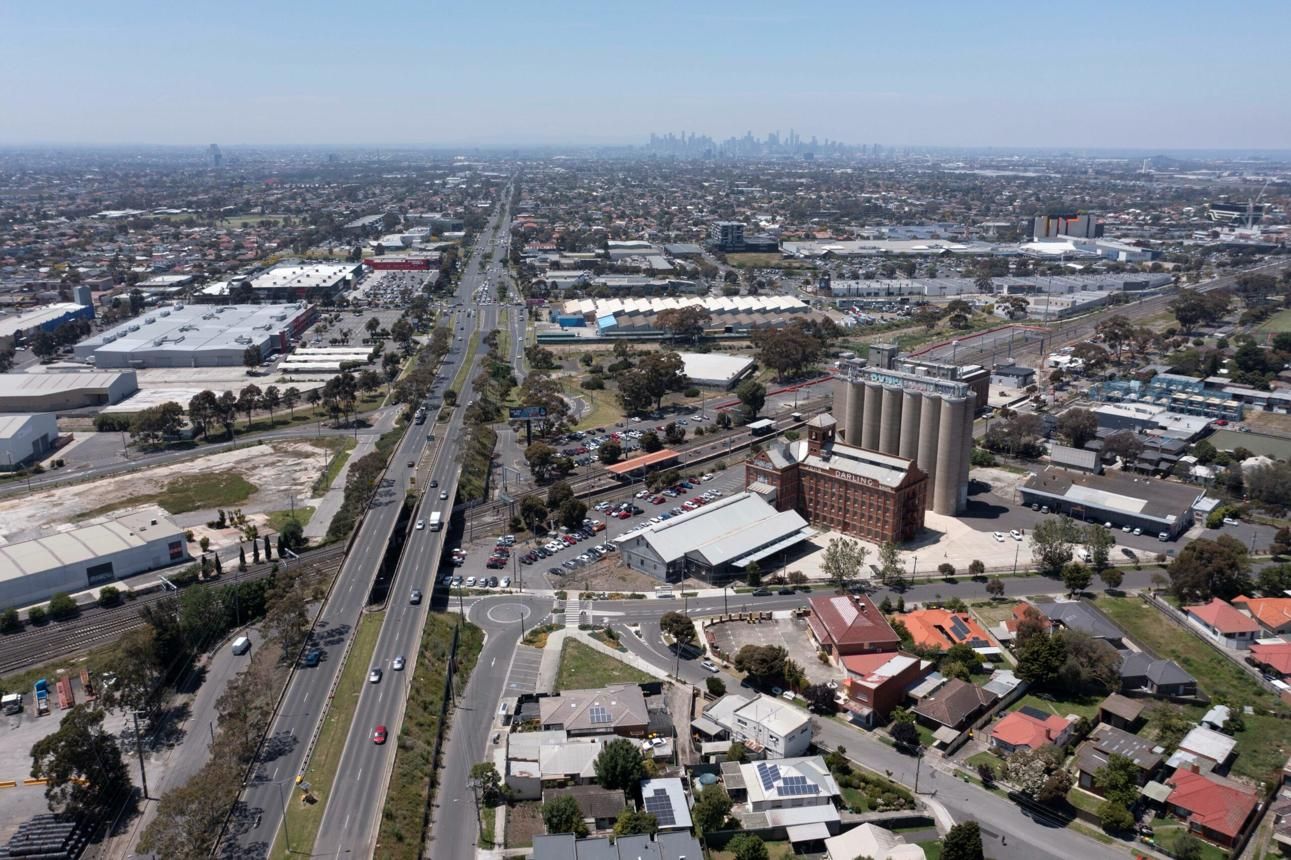 Aerial view of Albion with Melbourne skyline