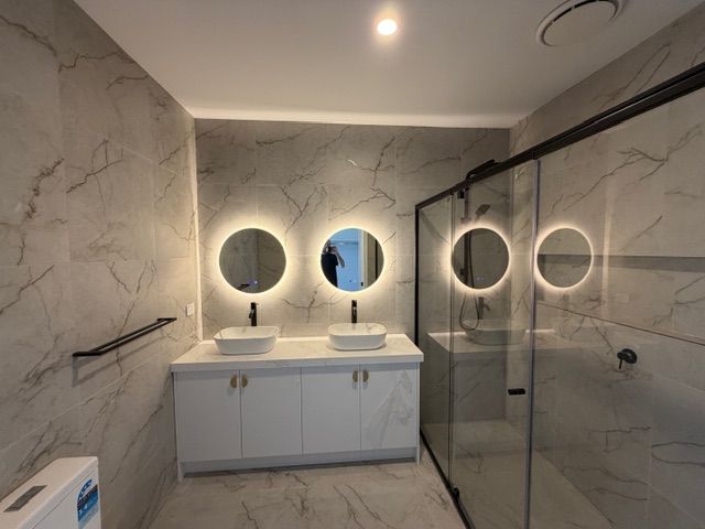 Bathroom LED mirror lighting installed by DTW Electrical